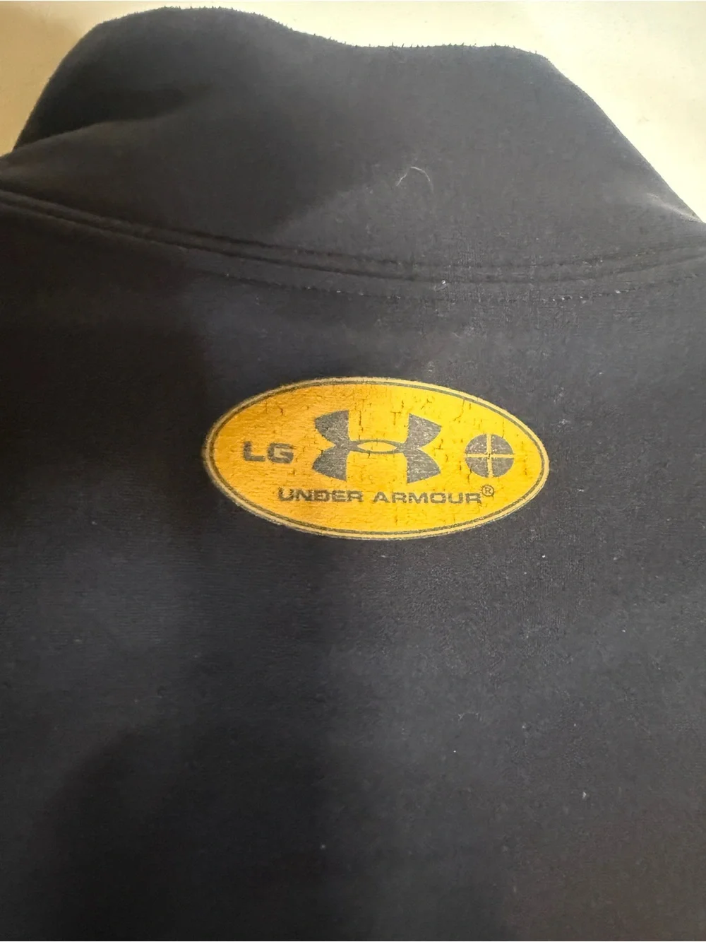 Under Armour Black Mock Neck Top with Gold Logo